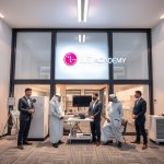 Emirati and business professionals gathered inside LG Academy training centre viewing appliances